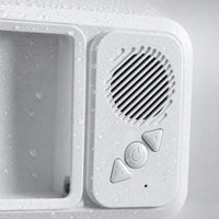 Detail of the speaker and touch buttons on AquaSound